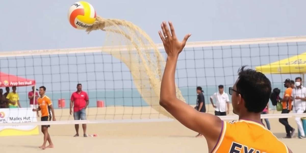 Beach Volleyball India Tour Player Indian player serving during Beach Volleyball India Tour match with sand flying